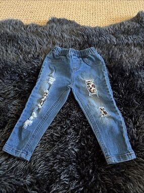 Baileys blossom baby jeans with animal print tears.